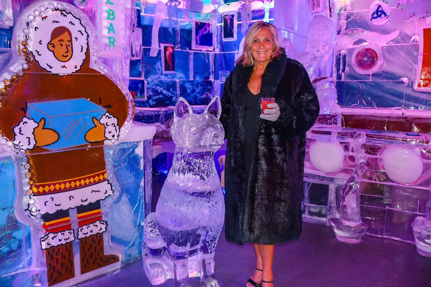 Carved ice sculptures lit in blue and violet neon inside the minus5 ICEBAR