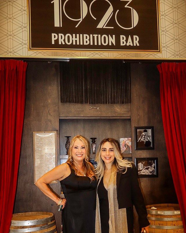 Two guests at the entrance to the 1923 Prohibition Bar during the Black Hat CISO Soirée, Las Vegas, August 2026